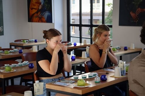 Students enjoy an olive oil tasting in Italy